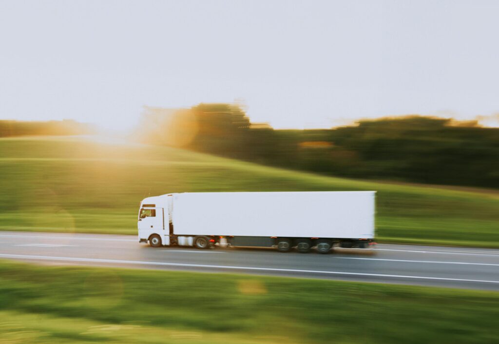 white truck in motion blur at sunset // белая фура в движении на закате
